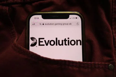 Evolution Gaming Group AB logo on mobile phone Stock Photos