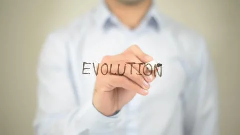 Evolution,  Man writing on transparent screen Stock Photos