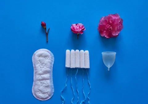 The evolution of a menstrual cycle from light to heavy flow - flat lay, concept Stock Photos