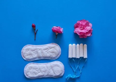 The evolution of a menstrual cycle from light to heavy flow - flat lay, concept Stock Photos