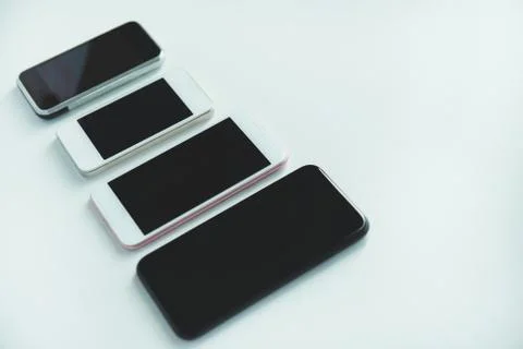 Evolution of mobile phones isolated on white background Stock Photos