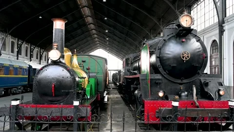 The evolution of steam power: a 19th vs 20th-century locomotive at Madrid's Stock Footage 310371168