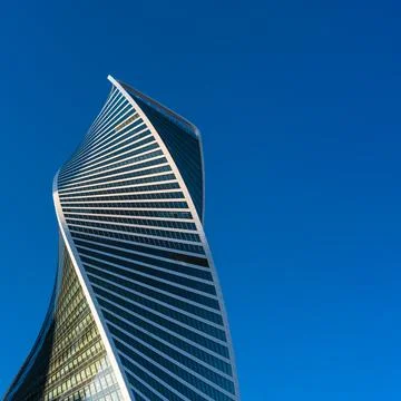 Evolution Tower against clear blue sky Stock Photos