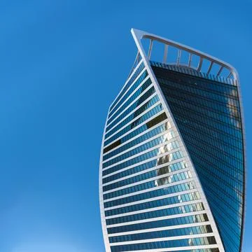 Evolution Tower Blue Sky Cloud Reflection Stock Photos