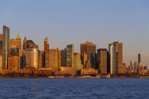 The evolving Downtown Manhattan skyline at sunset, panoramic view from Liberty Stock Photos