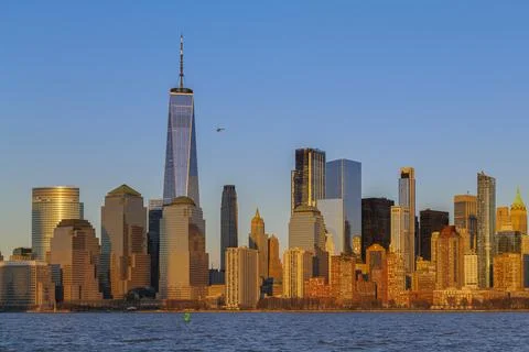 The evolving Downtown Manhattan skyline at sunset, panoramic view from Liberty Stock Photos