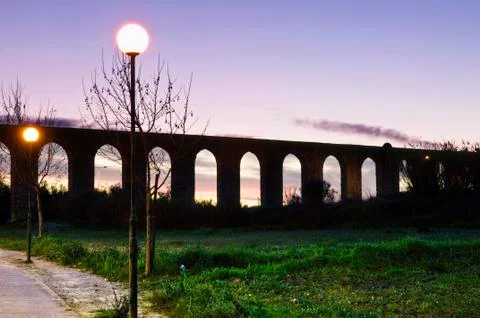 Evora aqueduct by night Stock Photos