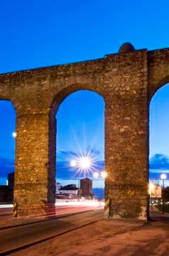 Evora aqueduct by night Stock Photos