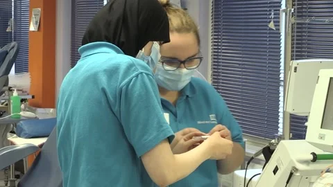Ex-firefighter makes 10th Covid-19 plasma donation Stock Footage 148563696