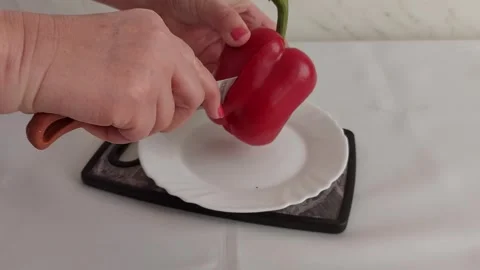 Exactly Slicing a Fresh Red Pepper Video stock 304045619