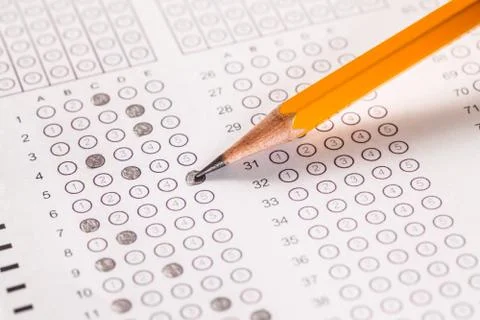 Exam carbon paper computer sheet and pencil Stock Photos