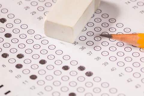 Exam carbon paper computer sheet with eraser and pencil Stock Photos