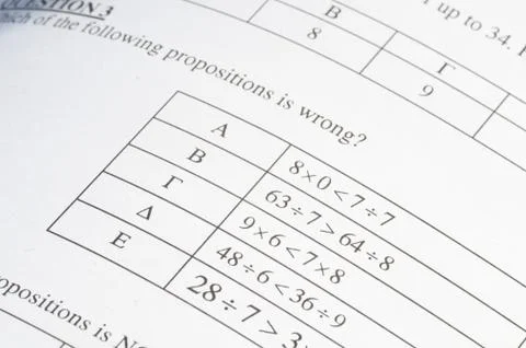 Exam paper with mathematics problem solving. Stock Photos