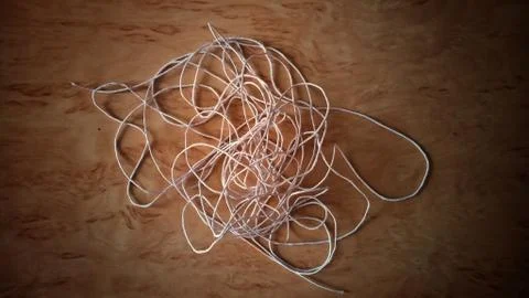 Exam thread to tie it up in the paper Stock Photos