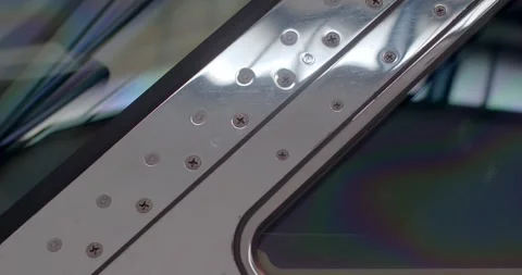 Examination of aircraft window components revealing craftsmanship Stock-Footage 333892554