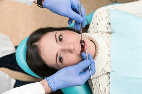 Examination of a patient teeth Stock Photos