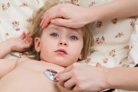 Examination of a sick child Stock Photos