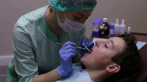 Examination of the teeth using a mirror and probe Stock Footage 57917221