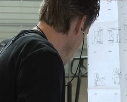 Examine construction drawings Stock Footage 8836072