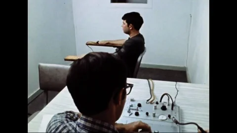 Examiner Operating The Polygraph During A Lie Detector Test Stock Footage 105199753