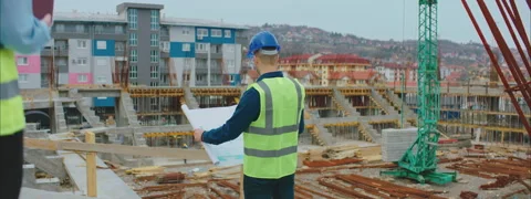 Examining Blueprints Video stock 150855977