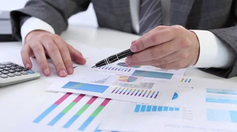 Examining business graph Stock Footage
