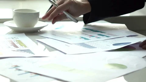 Examining business graph Stock Footage 83172059