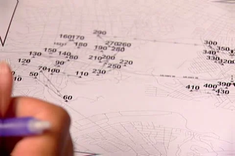 Examining a Chart Stock Footage 12605537