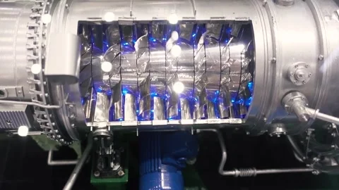 Examining the Complex Components of a Modern Industrial Gas Turbine Engine Unit 库存影片 308362800