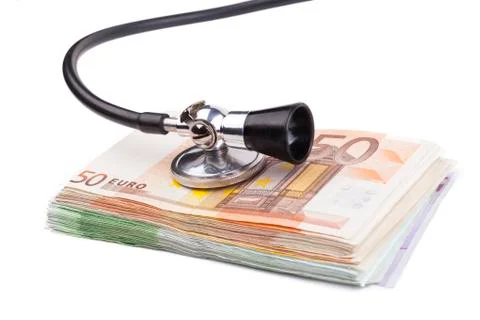 Examining euros Stock Photos