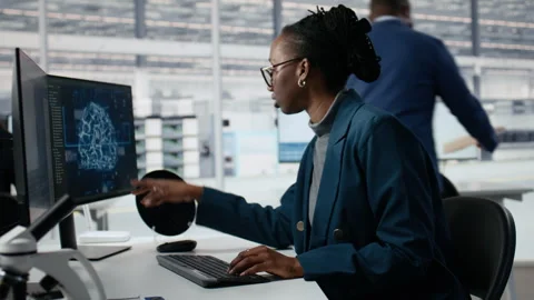 Examining microchip circuit layout, artificial intelligence and developer Stock Footage 335881220