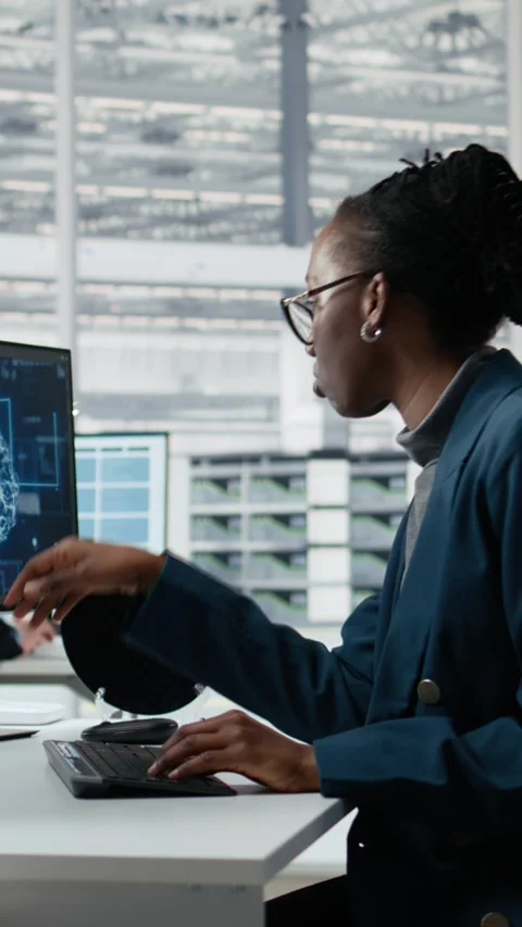 Examining microchip circuit layout, artificial intelligence and developer Stock Footage 335882964