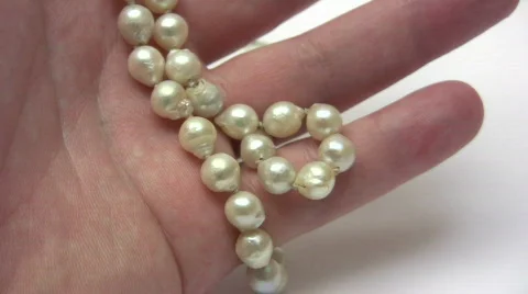 Examining Pearls Stock Footage 367122
