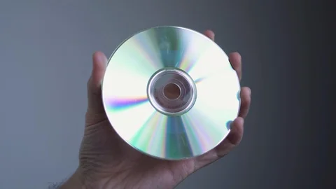 Examining a Scratched CD Disc Vidéo 121583350