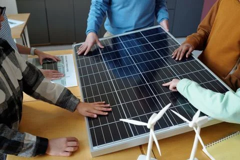 Examining Solar Panels in Interactive Classroom Setting Stock Photos