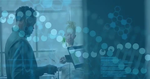 Examining staff in lab, center in white coat reviewing papers, laptop and tablet Stock Footage 333903322