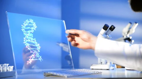 Examining Test Tube in front of a transparent computer screen 스톡 동영상 61134471