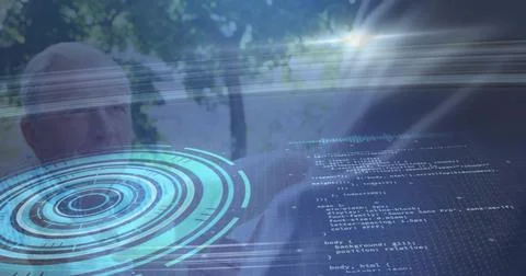 Examining two colleagues using holographic HUD and code panel in park, wearing 스톡 사진