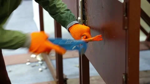 An example of breaking the front door lock Stock Footage 115048202