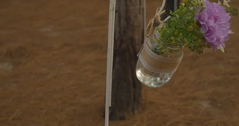 This is an example of Do it yourself decoration for an outdoor wedding in 스톡 동영상 128390104