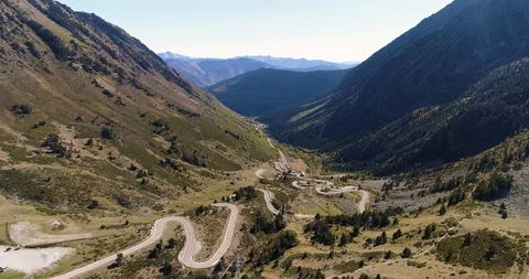 Example of how roads are built up mountains with multiple turns drone aerial 4k Stock Footage 125757052