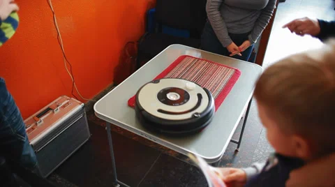 An example of the robot - vacuum cleaner Stock Footage 29676173