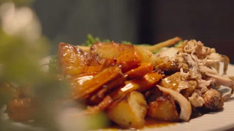 Example of Rustic British Sunday Dinner with Roast Chicken, Golden Potatoes Stock Footage 319982619