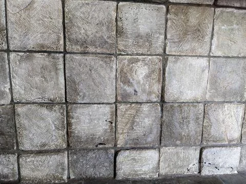 Example of square stone masonry as an exterior wall covering. Stone wall as.. Stock Photos