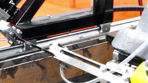 An example of the work of a machine for cutting a metal profile with a saw Stock Footage 147870910