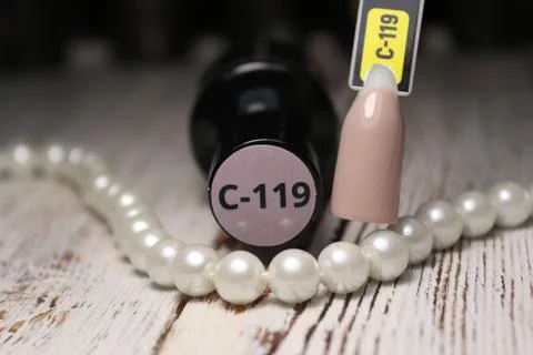 Examples of nails tips on pastel background top view. Stock Photos