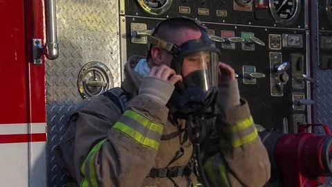 Exausted Firefighter Video stock 70331908