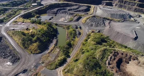 Excavated basalt open pit mine in Australia – aerial top down view as 4k. Stock Footage 158187451