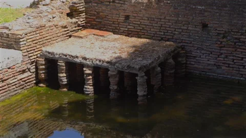 Excavated Hypocaust Underfloor Heating System Pillars Submerged In Water At The Vídeo Stock 342469224