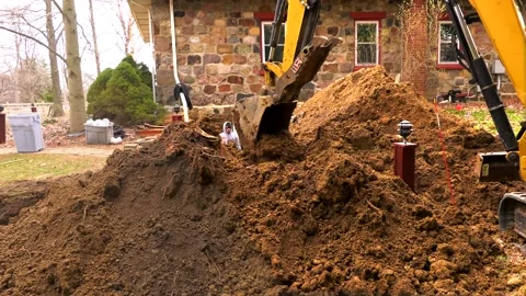 Excavating crew installs pipe underground 01610006 Video stock 153242891